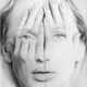 Illustration for article titled Hyper-realistic paintings look like huge double-exposure photos